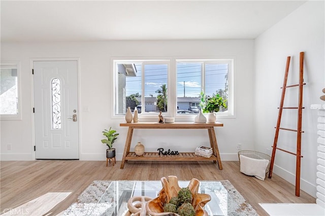 entryway with light hardwood / wood-style flooring