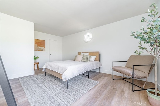 bedroom featuring light wood-type flooring