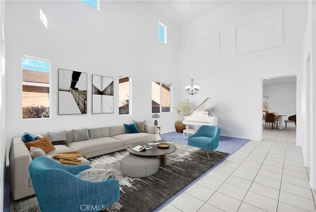 tiled living room with a high ceiling and an inviting chandelier