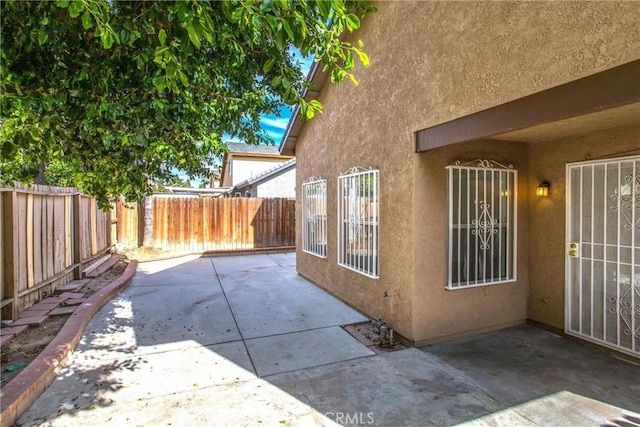 view of home's exterior with a patio area