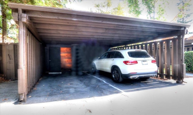 view of car parking featuring a carport