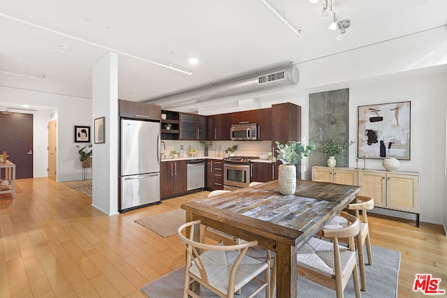 dining room featuring light wood-type flooring