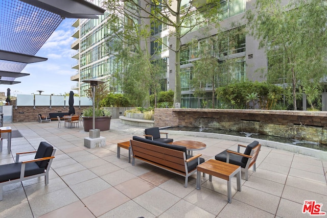 view of patio / terrace featuring a pergola