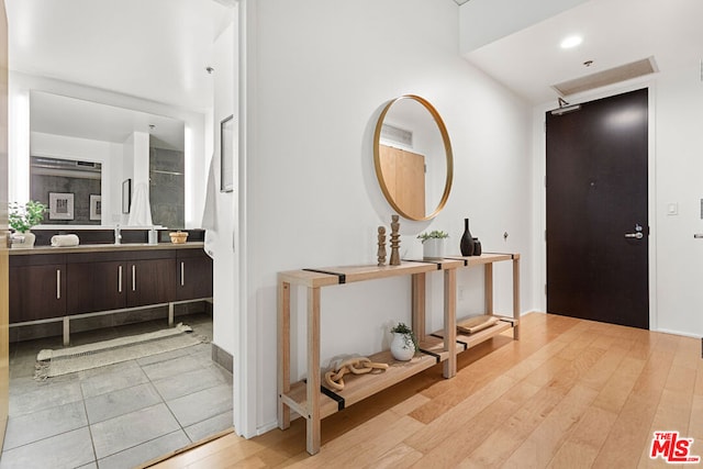 hallway featuring light hardwood / wood-style floors