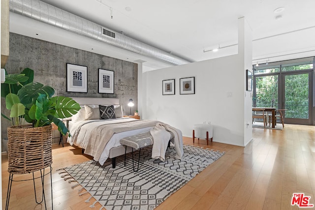 bedroom featuring light hardwood / wood-style flooring