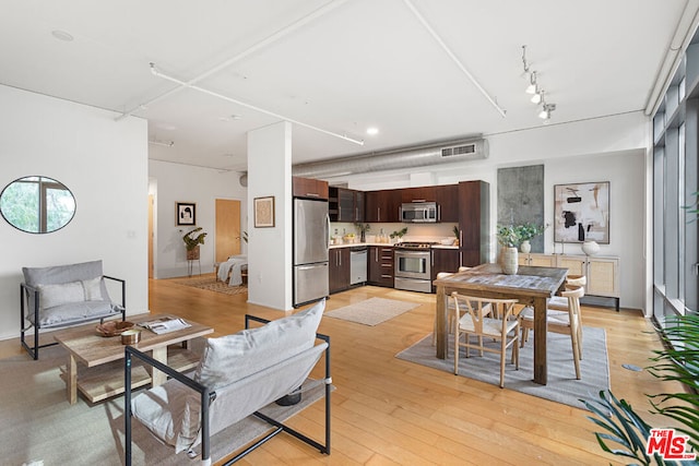 living room with light wood-type flooring