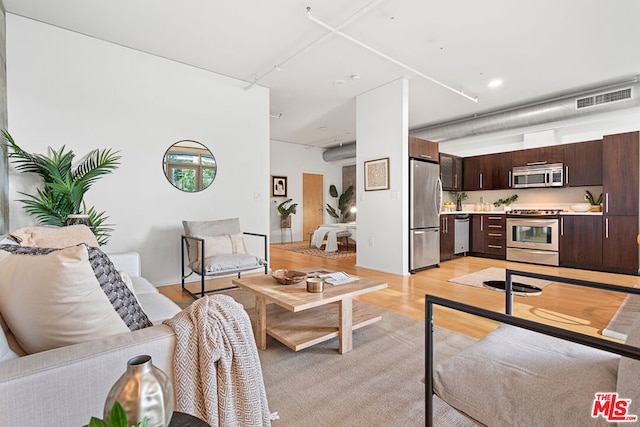 living room with light wood-type flooring