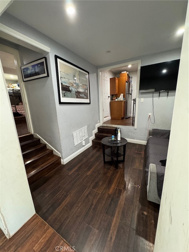 corridor featuring dark wood-type flooring