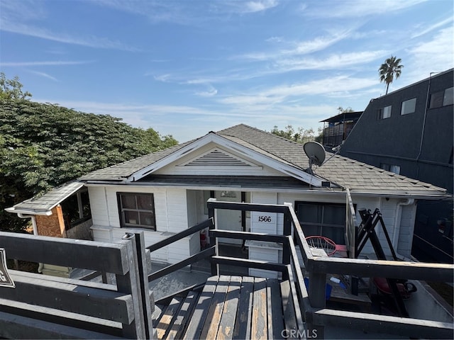 view of front of property with a wooden deck