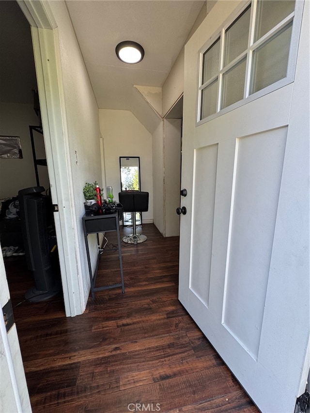 hallway featuring dark wood-type flooring