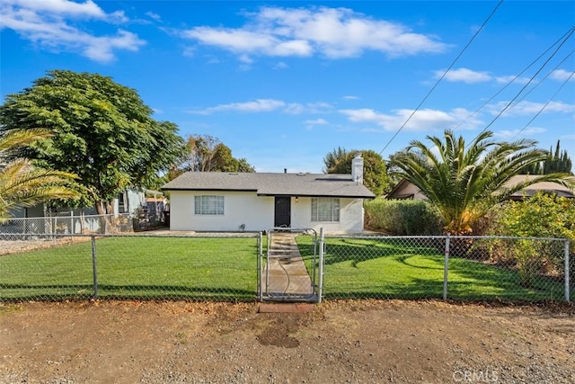 ranch-style house with a front lawn