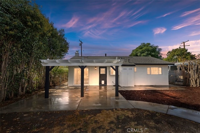 view of front of home featuring a patio area