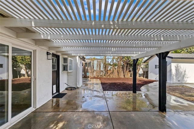 view of patio featuring a pergola