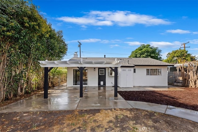 ranch-style house with a patio area