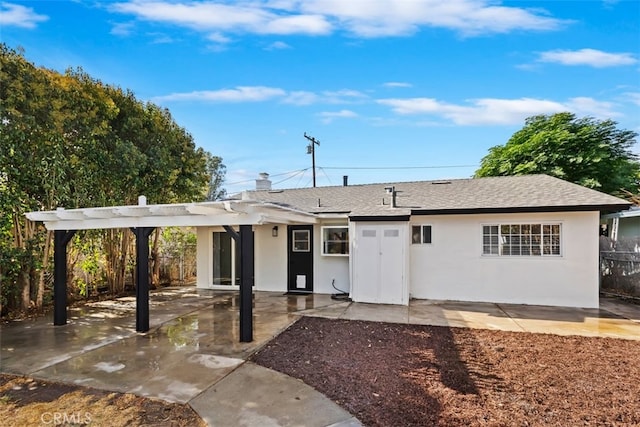 single story home featuring a patio area