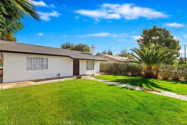 single story home with a front yard