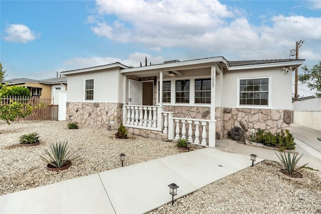 view of front of property featuring covered porch