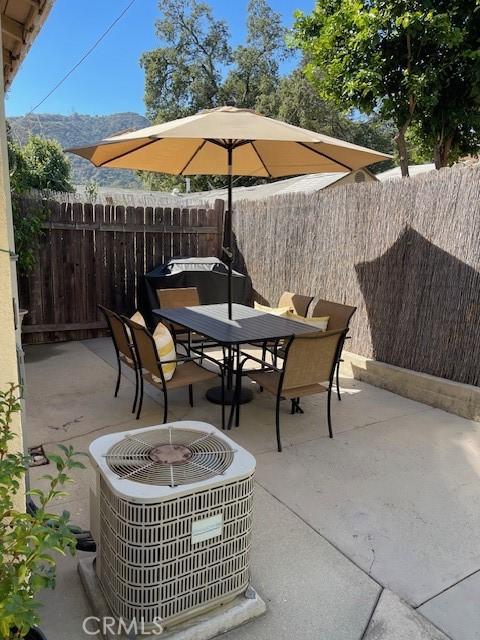 view of patio with cooling unit