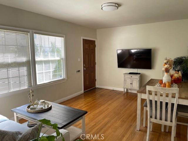 living room with light hardwood / wood-style floors