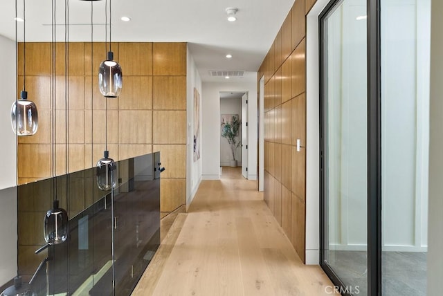 hallway featuring light hardwood / wood-style flooring