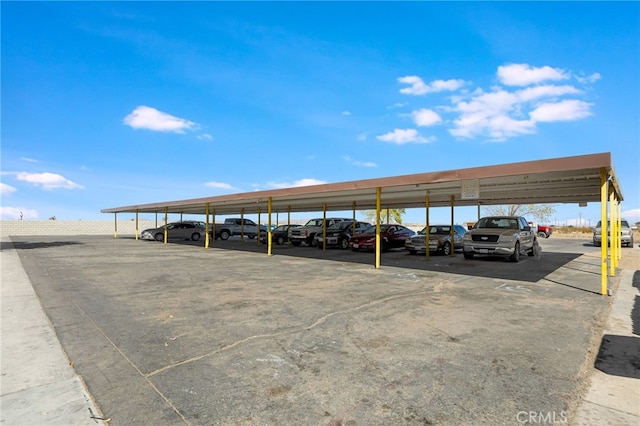 view of car parking with a carport