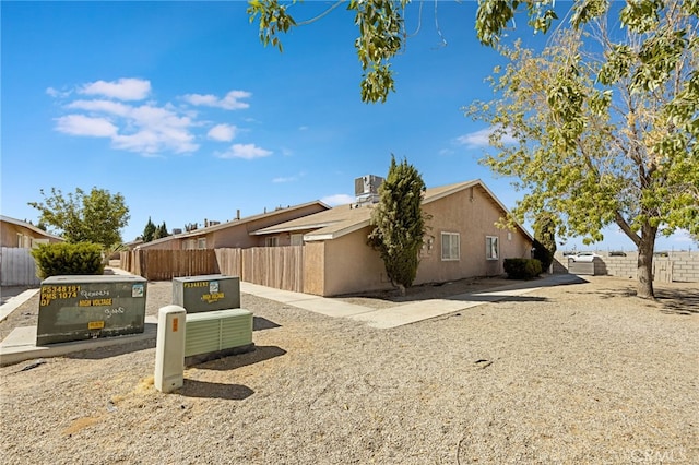 view of property exterior featuring central air condition unit