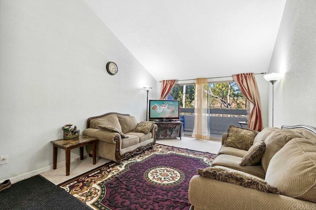 carpeted living room with lofted ceiling