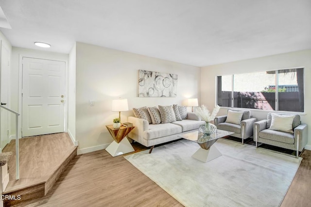 living room with light hardwood / wood-style floors