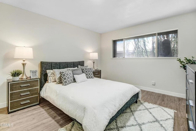 bedroom featuring light wood-type flooring