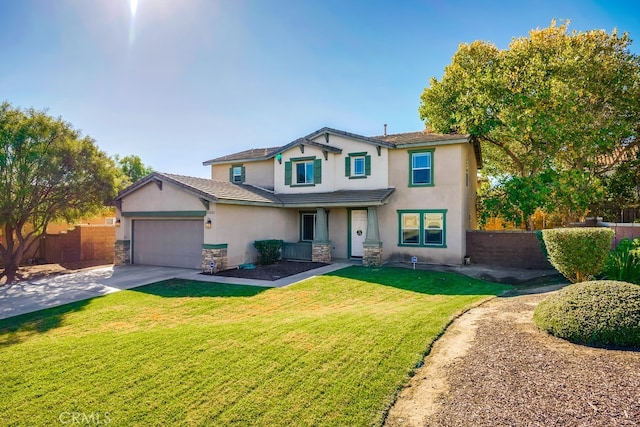 view of front of property featuring a garage and a front yard