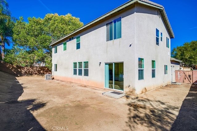 back of property with cooling unit