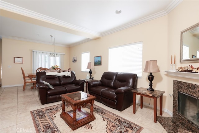 living room with a notable chandelier, ornamental molding, a fireplace, and light tile patterned floors