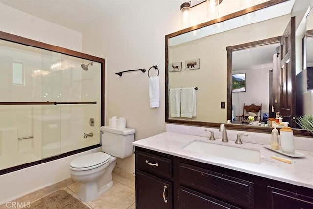 760 Blue Jay Rd Unit 10, Big Bear Lake, CA 92315 - bathroom with vanity, toilet, combined bath / shower with glass door, and tile patterned floors