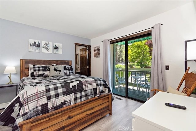 760 Blue Jay Rd Unit 10, Big Bear Lake, CA 92315 - bedroom featuring access to exterior and light wood-type flooring