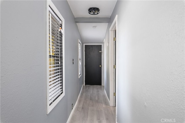 corridor featuring light hardwood / wood-style flooring