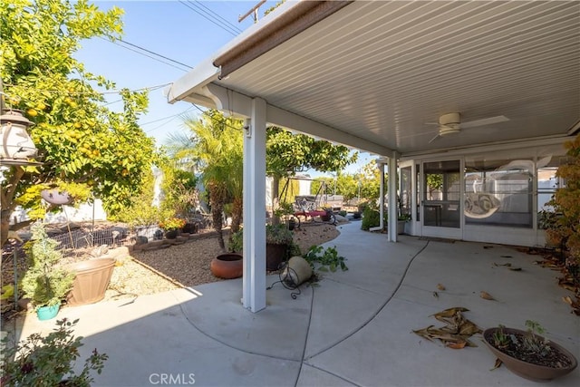 view of patio featuring ceiling fan