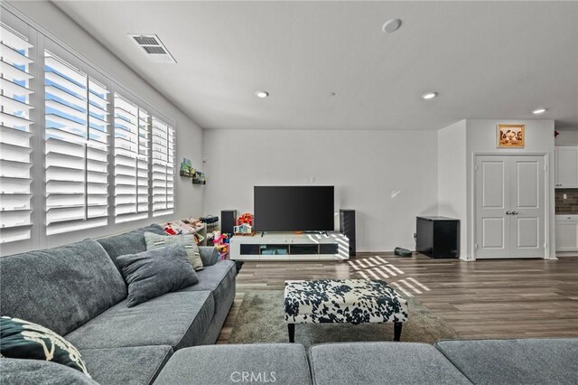 29707 Wolf Glen Ct, Winchester, CA 92596 - living area with wood finished floors and recessed lighting