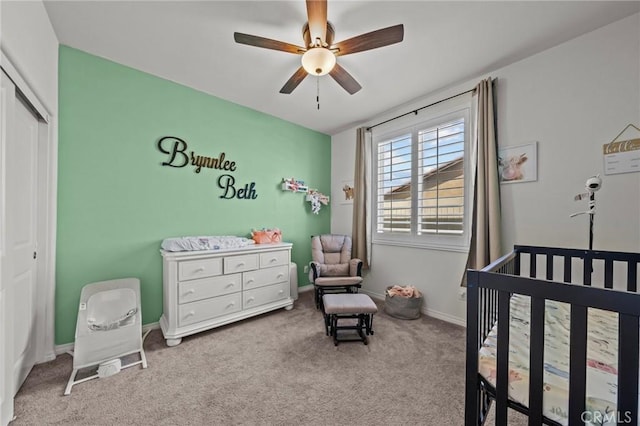 29707 Wolf Glen Ct, Winchester, CA 92596 - carpeted bedroom with a crib, a closet, a ceiling fan, and baseboards