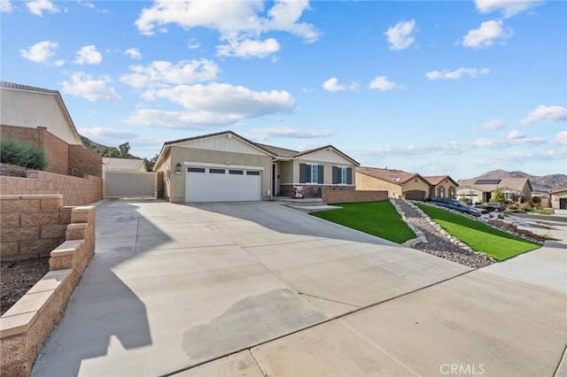 ranch-style home with an attached garage, fence, and driveway