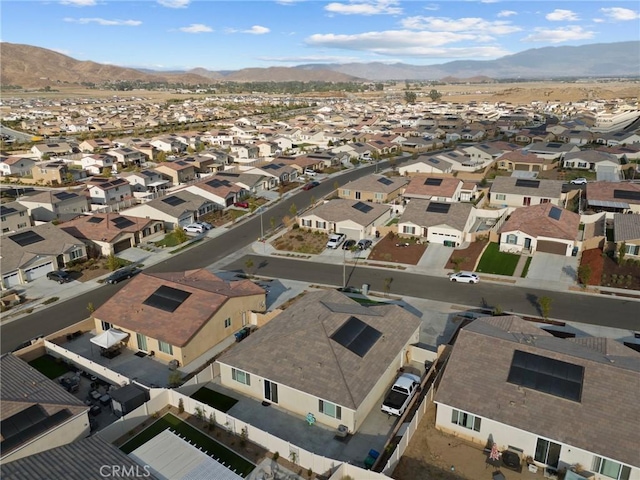 drone / aerial view featuring a mountain view and a residential view