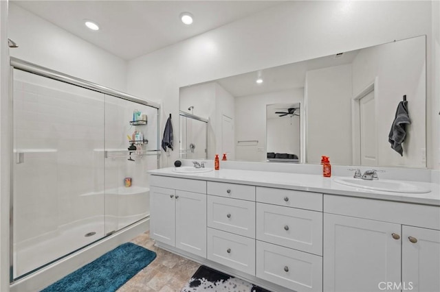 29707 Wolf Glen Ct, Winchester, CA 92596 - full bath with a stall shower, double vanity, recessed lighting, and a ceiling fan