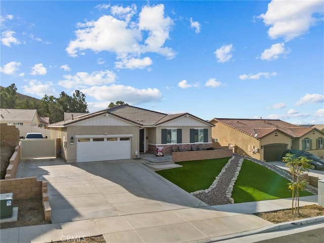 single story home with a gate, stucco siding, concrete driveway, a garage, and a tiled roof