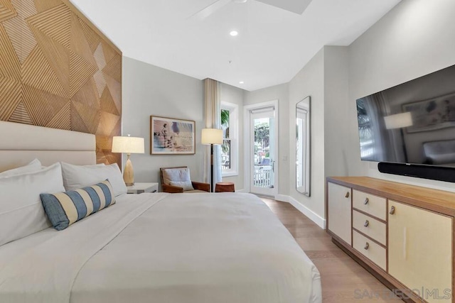 bedroom with ceiling fan, access to outside, and light wood-type flooring