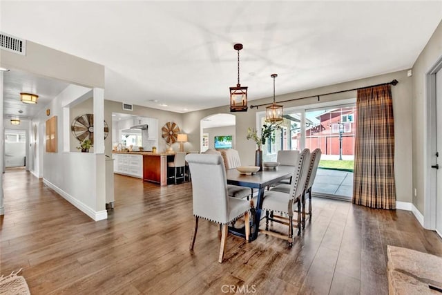 dining room featuring hardwood / wood-style flooring