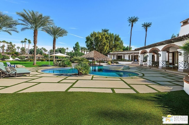 view of swimming pool with a gazebo and a patio