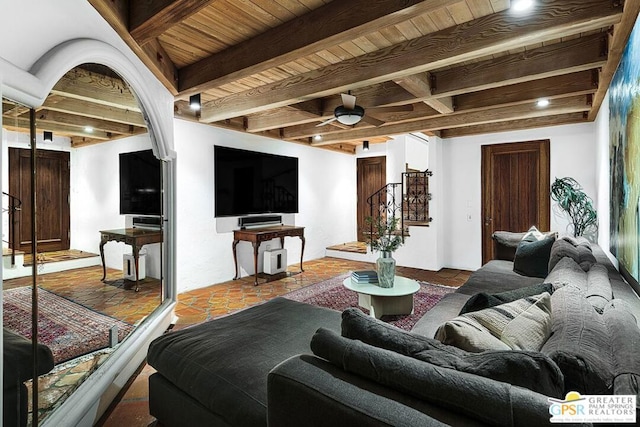 tiled living room with beam ceiling, ceiling fan, and wood ceiling