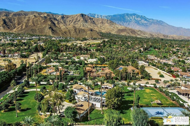 birds eye view of property featuring a mountain view