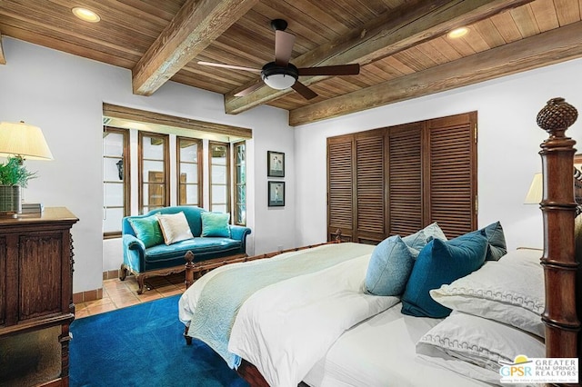 tiled bedroom featuring beamed ceiling, ceiling fan, and wood ceiling