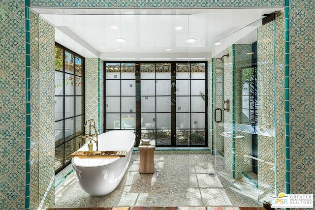 bathroom featuring a tub to relax in