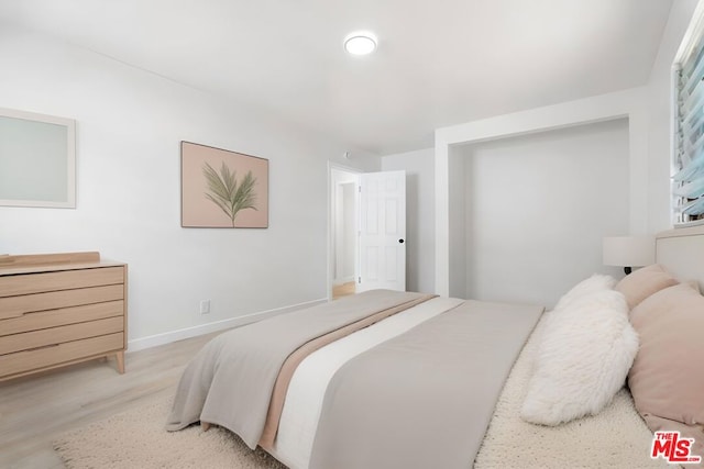 bedroom featuring light hardwood / wood-style flooring